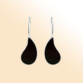 Elegant sterling silver teardrop earrings with black shell inlay, handcrafted Bali jewelry for women.